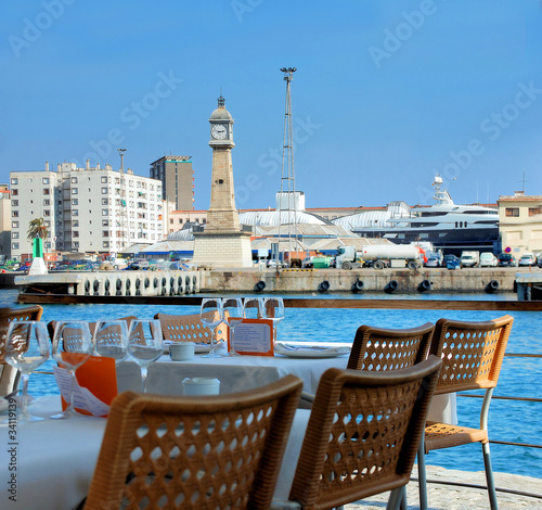 Photo: restaurant on quay in port of barcelona restaurant on quay in port of barcelona
