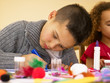 Photo: Young mixed race children doing handicrafts Young mixed race children doing handicrafts