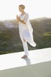 Mid adult woman practicing yoga