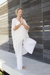 Mid adult woman practicing yoga