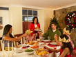 Photo: Hispanic family having Christmas dinner Hispanic family having Christmas dinner