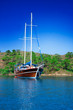 Boat on blue waters of Aegean Sea