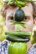 Portrait of a man holding vegetables