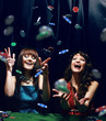 Young people have a good time in casino.