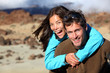 Happy young couple smiling outdoors