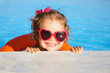 little  girl sunning at the pool
