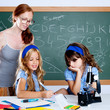 kids students with nerd teacher woman at school