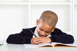 Photo: primary school student writing homework primary school student writing homework