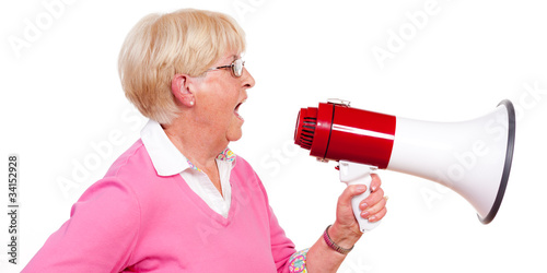 Photo: rentnerin ruft ins megafon rentnerin ruft ins megafon