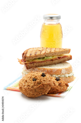 Photo: Apple juice, cookies, sandwiches Apple juice, cookies, sandwiches