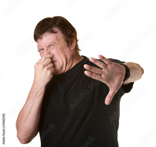 Photo: Man Pinches His Nose Man Pinches His Nose