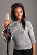 Beautiful black girl singer in studio relaxing