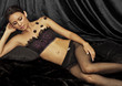 Beautiful young brunette woman in lingerie