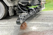 Truck spraying oil to prepare road for resurfacing Truck spraying oil to prepare road for resurfacing