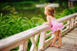 fashion little girl in tutu swimsuit outdoor