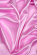 Smooth elegant pink silk as background Smooth elegant pink silk as background