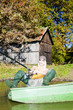 fishing woman sitting on boat