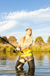 woman fishing in pond