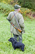hunter with his dog hunting