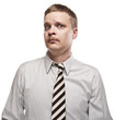 A humorous image of tired looking man with shirt and a tie.