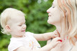 portrait of mother with her little daughter