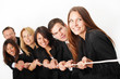 Teamwork an einem Strang ziehen