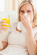 Portrait of a sick blonde woman