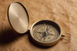 Vintage compass on old paper background Vintage compass on old paper background