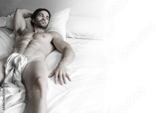 Photo: Sexy hunk in bed Sexy hunk in bed