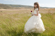 girl wearing first communion dress