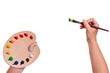 Artists hands with paint brush and palette isolated