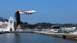 Landing of airplane above Vlacherna monastery, Corfu airport