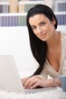 Portrait of woman with laptop