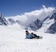 Photo: Snowboarder on ski slope Snowboarder on ski slope