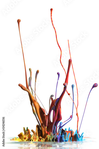 Photo: Colorful paint splashing isolated on white Colorful paint splashing isolated on white