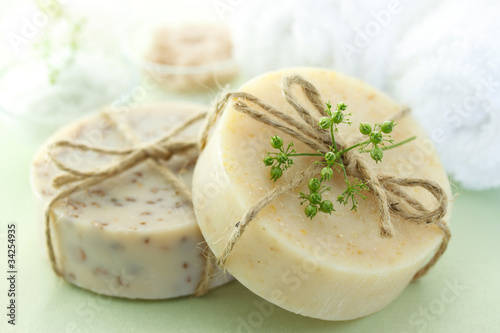 Photo: Bars of soap with bath salt and towel Bars of soap with bath salt and towel
