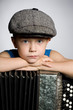 Boy with accordion.