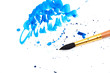 brush with blue paint stroke and stick