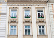 Facade of a building with windows Facade of a building with windows