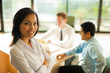 Attractive Asian Business Woman Stands Meeting