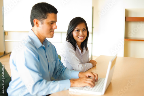 Photo: Asian And Hispanic Business Meeting Asian And Hispanic Business Meeting