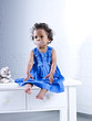Foto: süsses mädchen im blauen kleid süsses mädchen im blauen kleid