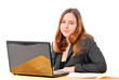 Business Woman Smiling at Camera on Computer
