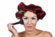 Beautiful Young Woman with a make-up brush Beautiful Young Woman with a make-up brush