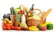 Groceries in wicker basket isolated on white