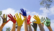 Children demonstrate their painted  palms