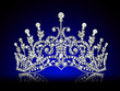 diadem feminine with reflection on black lighted background