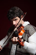 Man Plays His Violin