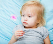 Sick girl is eating chocolate