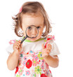 A little girl is looking through the loupe A little girl is looking through the loupe
